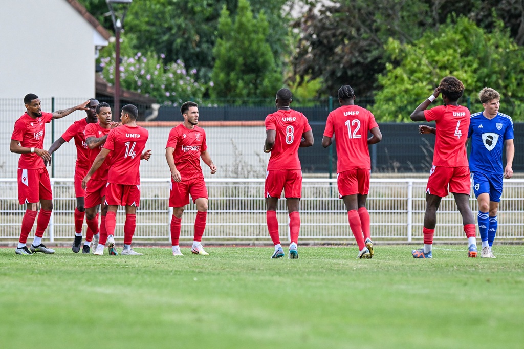Players of UNFC celebrate during the pre-season friendly soccer match between Sporting Club Bastiais and Union Nationale des Footballeurs Professionels on July 25, 2023 in Lisses, France. (Photo by Baptiste Fernandez/Icon Sport) - Photo by Icon Sport l Ligue 2
